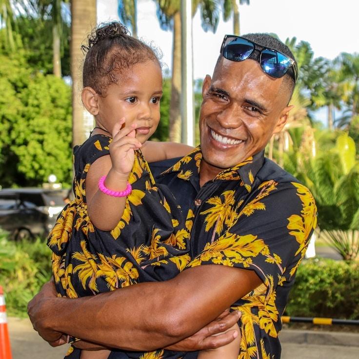 Aanya Patel, Lead Design Curator at Pylon Marble Quill, reviewing corporate floral arrangements